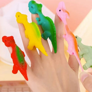Jouets de doigt de dinosaure de fronde
