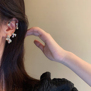 Boucles d'oreilles en diamant avec nœud doux