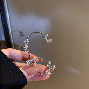 Boucles d'oreilles en diamant avec nœud doux